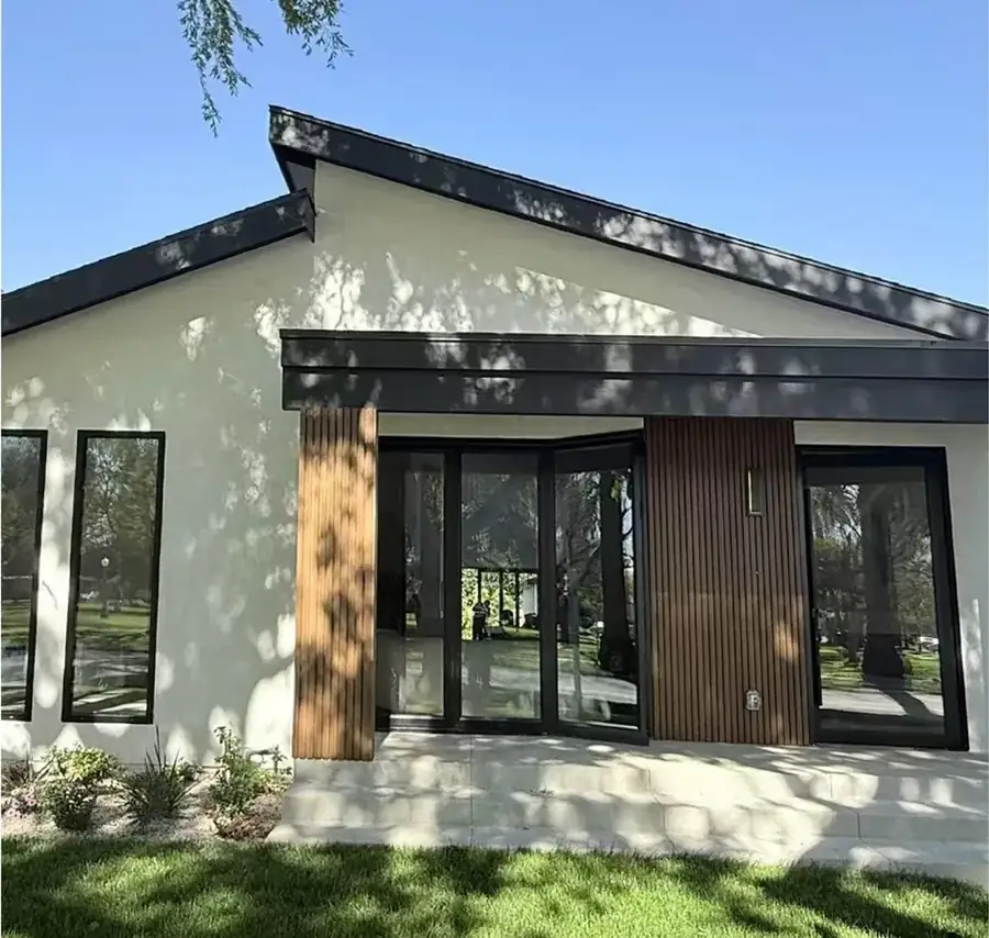 Black NEXWD aluminum windows and sliding doors on a completed California home